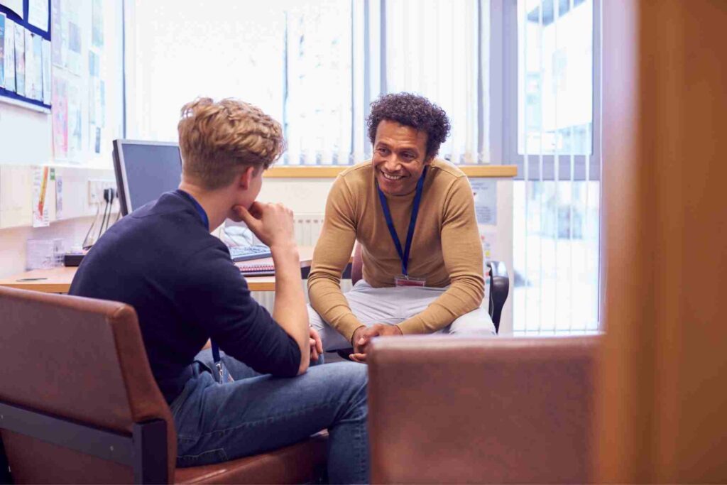 Licensed counselor meeting one-on-one with a client during an Intensive Outpatient Program (IOP) counseling session.